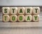 Cubes, dice or blocks with message start today on wooden background