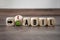 Cubes and dice showing the german words stable and unstable - stabil und unstabil on wooden background