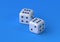 Cubes dice two white dices on blue background