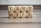 Cubes and dice with words last will on wooden background