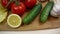 Cucumber, Chinese salad, tomato, lemon, garlic. Vegetables on cutting Board video, rotation