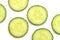 Cucumber circle slices on white background, close up