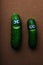 Cucumber face wooden background studio
