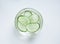 Cucumber slices vegetables glass bowl top isolated