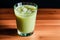 Cucumber smoothie in a glass on a black background. Green smoothie with lime and mint. Healthy food concept. Generative AI