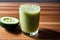 Cucumber smoothie in a glass on a black background. Green smoothie with lime and mint. Healthy food concept. Generative AI