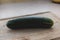 Cucumber on Wooden Cutting Board