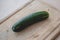 Cucumber on Wooden Cutting Board