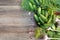 Cucumbers with dill herbs on a wooden background