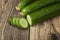 Cucumbers are green on a wooden background.Fresh vegetables. Sale