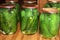 Cucumbers in jars with brine