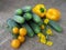 Cucumbers, peppers and tomatoes on linen cloth