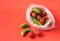 Cucumbers and tomatoes in plastic bag on blue background. Stop using artificial food storage bags concept