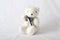 Cuddly stuffed teddy bear on a white neutral background