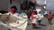 Cuenca, Ecuador, Dec 24, 2021 - COVID masked Women in native dresses dance in a Christmas parade.