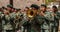 cuenca, Ecuador, Dec 24, 2021 - Men plays trombone in the traditional Traveling Child Pase del Nino Christmas Eve Parade