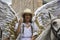 Cuenca, Ecuador / December 24, 2015 - Woman on horseback dressed as an angel