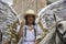 Cuenca, Ecuador - December 24, 2015 - Woman on horseback dressed as an angel