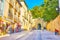 Cuesta de Gomerez street and the medieval gate, Granada, Spain