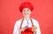 Cuisine. woman in cook hat and apron. happy woman cooking healthy food by recipe. Housewife with cooking knife and onion