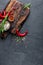 Culinary background with a space for a text. Flat lay composition of chili peppers, rosemary, spices and skewers for shish kebab o