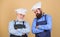 Culinary battle. Mature bearded men professional restaurant cooks competitors. Culinary show. Chef men wear aprons