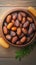 Culinary elegance Dates in a bowl on wooden backdrop