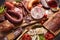 Culinary food background of various smoked meats, salami sausages, dry cured  fillet and chorizo, whole and sliced flat cut