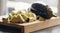 Culinary Precision: Cut Eggplants on Wooden Board CloseUp