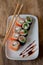 Culinary product, Japanese rolls, fish and rice, chopsticks