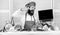 Culinary school. Hipster in hat and apron buy products online. Shopping online. Man chef searching online ingredients