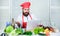 Culinary school. Hipster in hat and apron learning how to cook online. Culinary education online. Elearning concept. Man