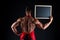 Culinary school information. Cook hold information board in strong hand back view. Muscular man with blank blackboard on
