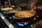 Culinary symphony Pots simmer with cooking food on a gas stove