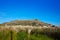 Cullera mountain with white sign writted on in