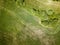 cultivated agriculture fields from above birds eye in summer