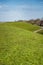 Cultivated Dutch dike landscape along the Wadden Sea in the north of Holland