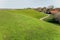 Cultivated Dutch dike landscape along the Wadden Sea in the north of Holland