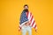 Cultural identity. American man celebrate Independence day. July 4th. American citizenship. Hipster hold american flag