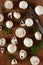 Cultured mushrooms champignons on wooden background