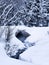 Culvert and stream in winter