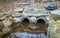 Culverts, concrete tubes leading the river under a road