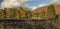 Cumbria, Lake District, England - a stone fence and some hills.