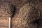 Cumin.Caraway seeds on wooden table. Cumin in vintage bronze bowl and spoon