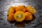 Cumquat on a black background