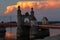 Cumulonimbus cloud at sunset over the arch of the Queen Louise Bridge
