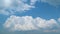 Cumulonimbus cloudscape with bright white cloud formations. Clouds explode fluffy majestic. Timelapse.