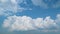 Cumulonimbus grow before thunderstorm explodes air cloud on summer blue sky. Natural introduction. Timelapse.