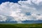 Cumulonimbus thunderstorm cloud with blue sky.