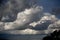 Cumulous clouds against dark sky